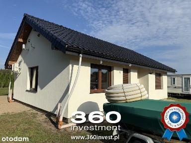 Nowy, wykończony dom parterowy i domek holenderski