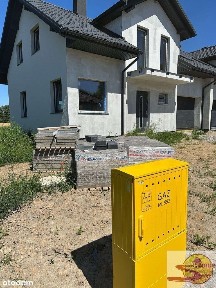 Dom z tarasem/stan surowy zamknięty