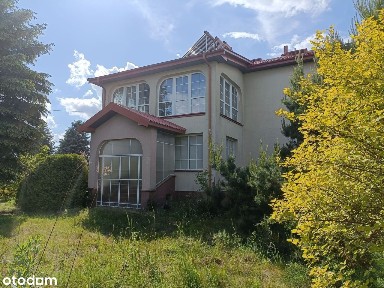 Dom z budynkami gospodarczymi na działce 1 ha