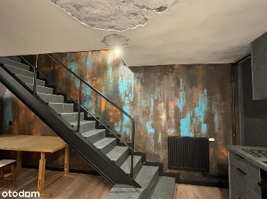 Loftowe mieszkanie w suterenie domu wolnostojącego