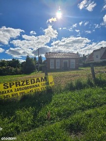 Nieruchomość gruntowa o pow 0,1809 ha dom po pow zabudowy 115m2
