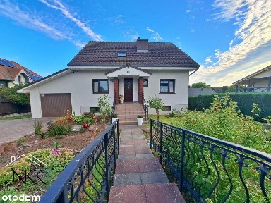 Rodzinny dom z pięknym ogrodem, stawem i 2 garażami -Lubniewice