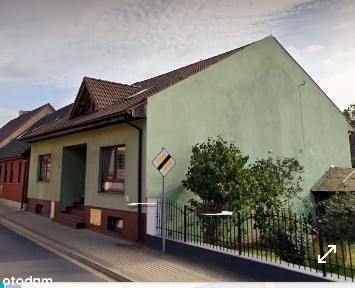 Dom z osobnym mieszkaniem i dużym ogrodem.