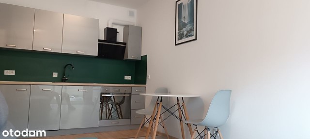 Mieszkanie z m. p. w garażu podziemnym