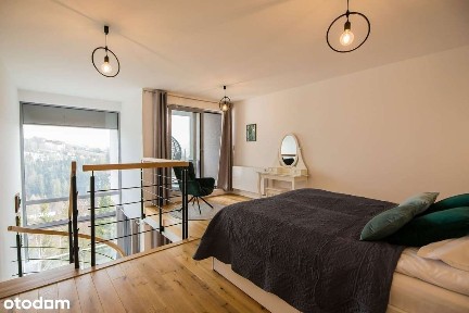 Dwupoziomowy apartament z pięknym widokiem + miejsce w hali garażowej