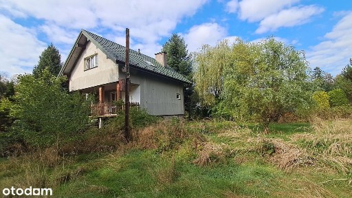 Dom z potencjałem na 20-arowej działce w okolicy Dobczyc