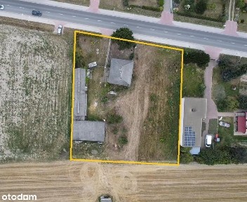 Działka zabudowana (Dom i 2 budynki gospodarcze).