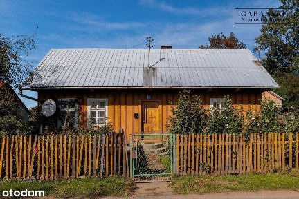 Drewniany dom z budynkami gospodarczymi - Pawłów