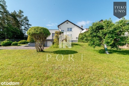 Dom nad jeziorem z piękną, dużą działką!