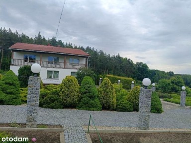 Parter domu z budynkiem gospodarczym