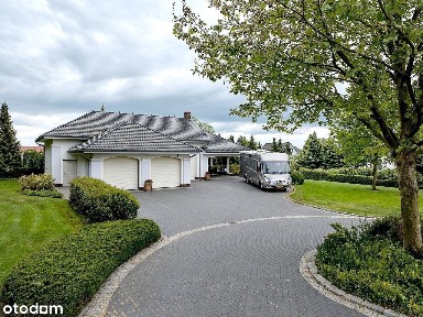 Rezydencja z pięknym ogrodem, sauną i garażami