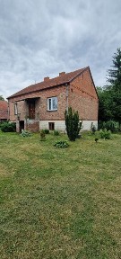 Dom plus budynki gospodarcze