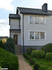 Dom z ogrodem i dwoma garażami w Dolinie Drwęcy