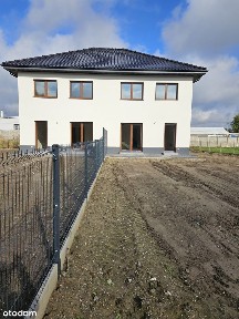 Dom w zabudowie bliźniaczej z dużą działką. Brak PCC