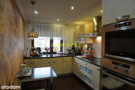 Umeblowane mieszkanie trzypokojowe o pow.77,50m, II p.balkon, garaż