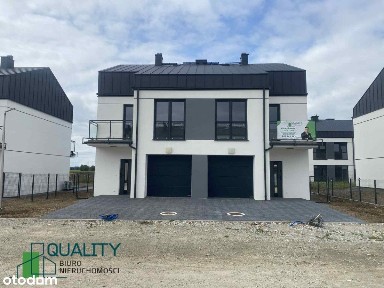 Domy z Garażami w Skórzewie - Komfort i Spokój!