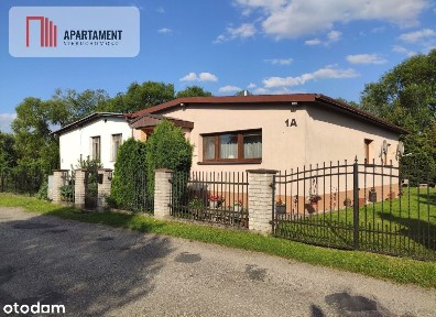 Dom z dodatkową działką budowlaną.