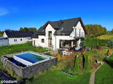 Dom z garażem i przestronną działką