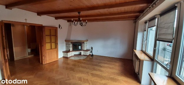 Dom w zabudowie szeregowej z lokalem usługowym