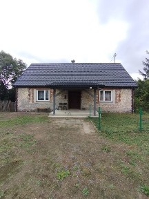 Nieruchomość z potencjałem Duża działka Dom z Budynkami Rośle!