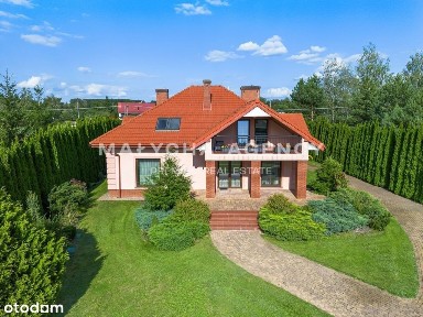 Dom z ogrodem i dostępem do jeziora