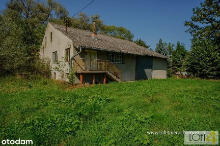 Dom z piękną 70 arową działką w Szczurowej