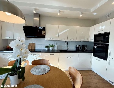 Mieszkanie z ogródkiem, garażem i dwoma miejscami postojowymi