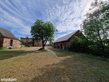 Nieruchomość z zabudowaniami gospodarczymi