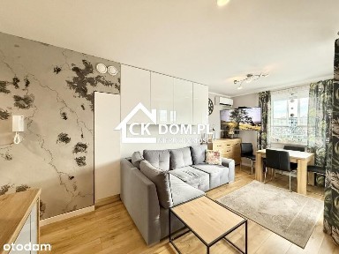 Kawalerka Witosa z dużym balkonem urządzona