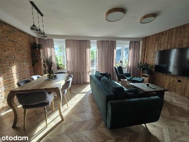 Dom po remoncie z ogrodem