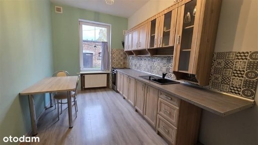 Mieszkanie z garażami i ogródkiem