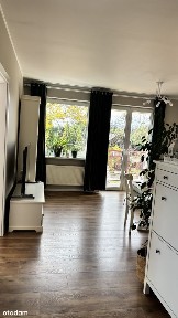 Minimalizm, który tworzy spokój - 3 pokojowe mieszkanie w Dąbrówce