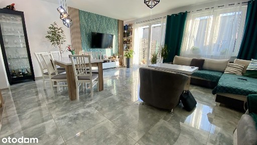 Nowoczesny dom szeregowy z pompą ciepła i fotowoltaiką - Dąbrowa