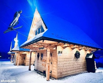 Trzy drewniane domki w Murzasichlu koło Zakopanego