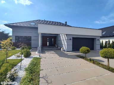 Energooszczędny dom z antresolą i dużym tarasem