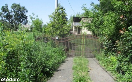 Grunt zabudowany 2 budynkami mieszkalnymi i gospodarczym LICYTACJA