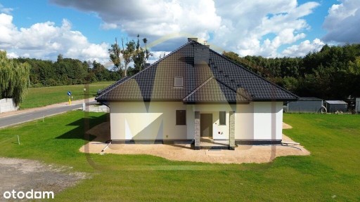 Komfortowy dom na dużej działce w otoczeniu