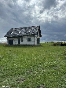 Dom Jednorodzinny stan surowy zamknięty z ziemią 1 ha.