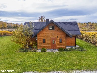 Dom drewniany z prywatnym pomostem i linią brzegową | Prywatny Staw