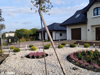 Budynek mieszkalny jednorodzinny z garażem, piwnicą i ogrodem