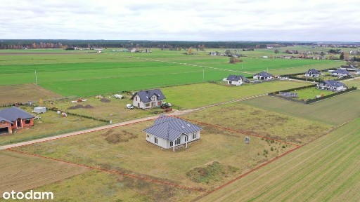Atrakcyjna działka z nowym domem jednorodzinnym