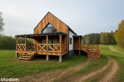 Nowoczesny dom z antresolą i garażem w otoczeniu lasu i jezior