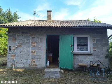 Działka z zabudowaniami z własnym lasem