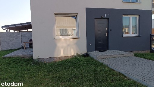 Nowoczesne mieszkanie z tarasem i ogrodem