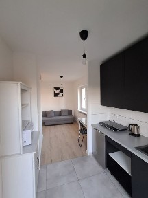 Kawalerka z balkonem na osiedlu kwiatowym