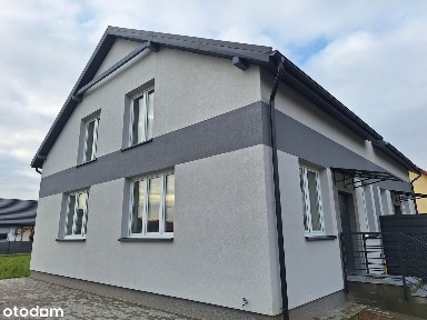 Nowoczesny dom z dużym ogrodem.