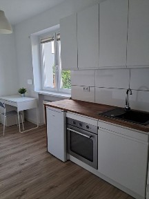 Przytulna kawalerka na osiedlu kwiatowym