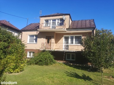 Przestronny dom z garażem i działką 9200 m²