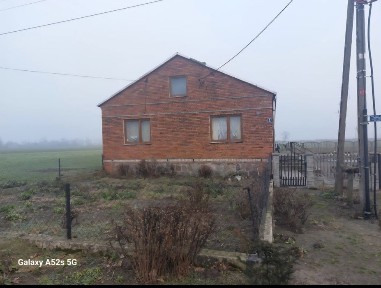 Dom 120 m² + pomieszczenie gospodarcze 100 m² z działką 1550 m2.