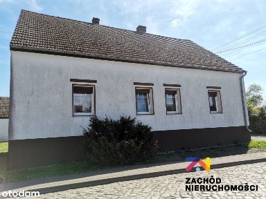 Dom z zabudowaniami - PoŁęcko